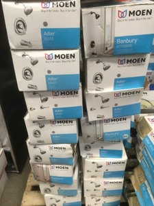 lot 20 image: Lot of 16 Tub and Shower Faucet open boxes some used some missing pieces for parts or Repair