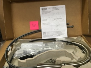 lot 133 image: Delta Leland Single-Handle Pull-Down Sprayer Kitchen Faucet with Soap Dispenser in Stainless