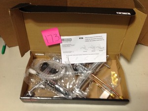lot 173 image: Foundations Single-Handle Standard Kitchen Faucet with Side Sprayer in Chrome