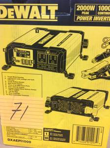 lot 71 image: DEWALT DXAEPI1000 Power Inverter 1000W Car Converter with LCD Display Dual 120V AC Outlets, 3.1A USB Ports, Battery Clamps in good condition