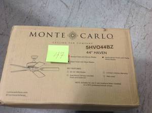 lot 47 image: Monte Carlo Haven 44 in. IndoorOutdoor Bronze Ceiling Fan in good condition