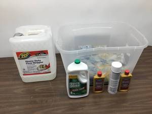 lot 8 image: Mixed Lot Of Cleaning Supplies Floor Stripper, Brasso, Bio Solutions Deep Scrub, Glass CleanerTile And Floor