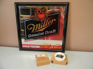 lot 39 image: VINTAGE MILLER GENUINE DRAFT BEER BAR SIGNMIRROR WITH 4 NEW OLD STOCK MILLER GENUINE DRAFT BAR COASTERS - SEE PICTURES