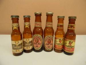 lot 42 image: 3 DIFFERENT SETS OF VINTAGE ESSLINGERS ALEBEER MINI BOTTLE SALT & PEPPER SHAKERS - INCLUDING 1 Pair of 1930s Esslingers Little Man Ale Salt & Pepper Shakers with Decal Labeling (RARE AWESOME SET) - GREAT COLLECTION - SEE PICTURES