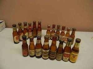 lot 54 image: VINTAGE COLLECTION OF 20 MINI BEER BOTTLES - SOME RARE - SEE PICTURES