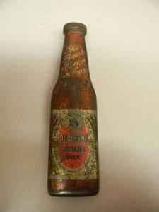 lot 69 image: VINTAGE DUQUESNE PILSNER BEER METAL ADVERTISING BEER BOTTLE OPENER - SHAPED LIKE A BOTTLE - RARE - SEE PICTURES