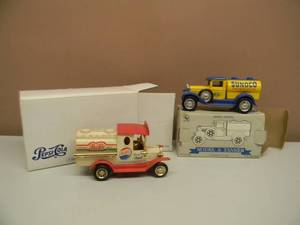 lot 109 image: Pepsi Cola Collectible Bank Die Cast Truck 100 Year Anniversary 1898 - 1998 WBOX &  SUNOCO FORD MODEL A 125 SCALE DIE CAST COIN BANK - SEE PICTURES