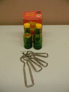 lot 113 image: VINTAGE SQUIRT SALT AND PEPPER SHAKERS WITH ORIGINAL BOX & VINTAGE POP OPENERS - PEPSI - 7uP - WHITE ROCK - QUEVIC ROOT BEERGINGER ALE - SEE PICTURES