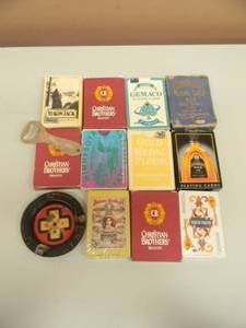 lot 117 image: VINTAGE TERRIBLES LAKESIDE CASINO CARDS - RARE - LOUIES TIN CARD ASHTRAY - HILTON HOTELS OPENER & 5 DECKS LIQUOR CARDS - SEE PICTURES