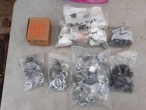 lot 31 image: Lot Of Plugs Plastic & Metal & Lock Nuts