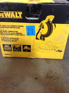 lot 19 image: DEWALT 10 in. 15 Amp Compound Miter Saw in good conditions