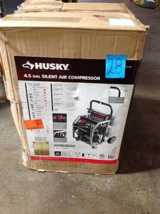 lot 28 image: Husky 4.5 Gal. Portable Electric-Powered Silent Air Compressor in good conditions