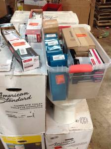 lot 11 image: PALLET OF AMERICAN STANDARD COMPLETE TOILETS AND DELTA BATHROOM ACCESSARIES.(SEE PICTURES)