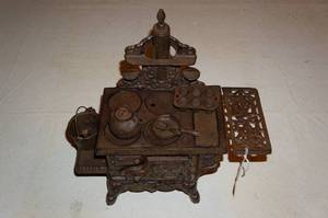 lot 229 image: Antique Miniature Cast Iron Stove Set