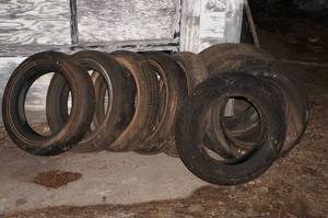 lot 317 image: Table, Shelf, Propellers, Jack, and Tires