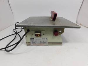 lot 83 image: 7 Tile Cutting Machine