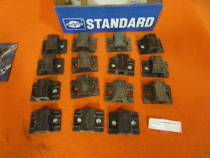 lot 96 image: (New) Mudflap Mounting Brackets, Headlight Bezel, HeatAC Louvers