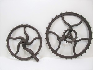 lot 218 image: 2 Antique Cast Iron Curved-Spoke WheelsGears