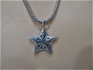 lot 199 image: Signed JANICE GIRARDI Sterling Silver Pierced Star Pendant Necklace