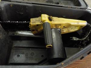 lot 305 image: Poulin Chain Saw as found in a hard...