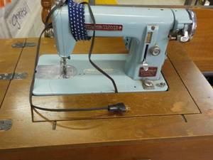 lot 335 image: New Home Sewing Machine in Cabinet ...