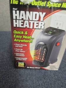 lot 16 image: 350-Watt Wall Outlet Handy Heater o...