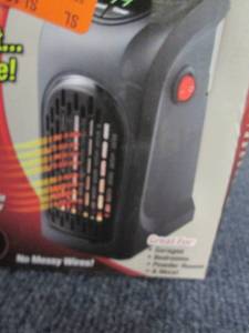 lot 56 image: 350-Watt Wall Outlet Handy Heater o...