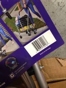 Milwaukee 3-Wheel Steel Easy Climb Shopping Cart Design with Accessory Basket in Silver in good condition