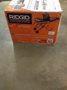 RIDGID 10 in. Wet Tile Saw with Stand in really good working conditions