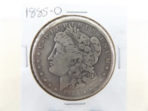 lot 101 image: 1885-O Morgan Silver Dollar