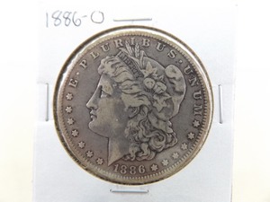 lot 102 image: 1886-O Morgan Silver Dollar