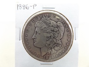 lot 103 image: 1886-P Morgan Silver Dollar