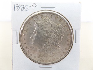 lot 104 image: 1886-P Morgan Silver Dollar