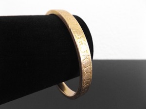 lot 59 image: 14k Yellow Gold Etched Rose Bangle Bracelet