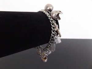lot 84 image: Vintage .925 Sterling Silver Charm Bracelet w13 Charms