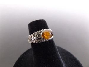 lot 95 image: .925 Sterling Silver Amber Cabochon Ring Size 4.25