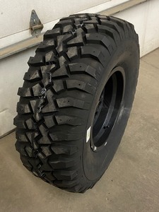 lot 21 image: (1) Truck Tire With Wheel