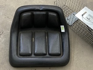 lot 22 image: Animal Trap & Tractor Seat