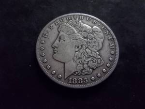 lot 13 image: 1883 CC Morgan Silver Dollar