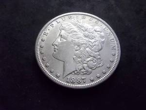 lot 20 image: 1887 S Morgan Silver Dollar