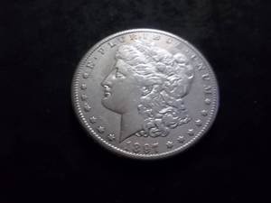lot 28 image: 1897 S Morgan Silver Dollar