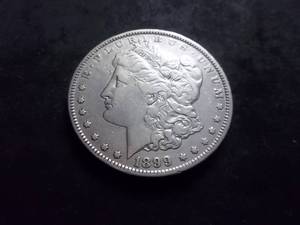 lot 30 image: 1899 O Morgan Silver Dollar