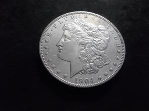 lot 35 image: 1904 O Morgan Silver Dollar