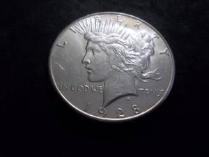 lot 57 image: 1928 S Silver Peace Dollar