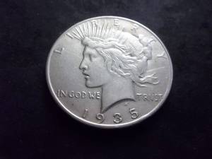 lot 61 image: 1935 Peace Silver Dollar