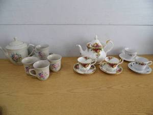 lot 46 image: Teapots - CupsSaucers