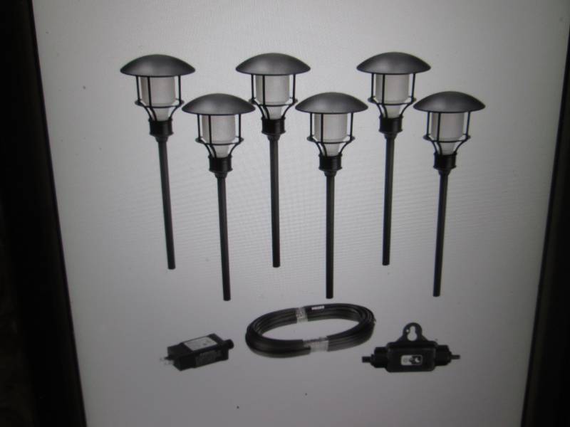 lot 32 image: 6-Pack Low Voltage Black Outdoor In...