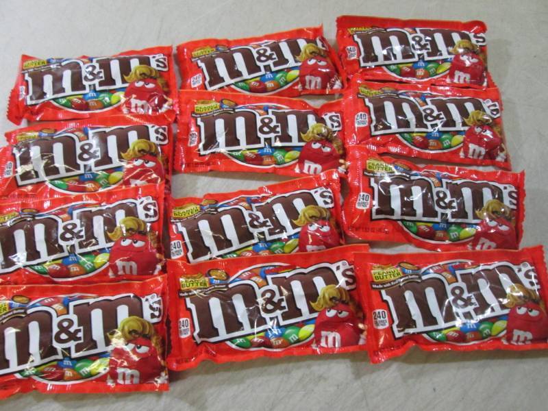lot 240 image: 12 Bags of Peanut Butter M&Ms Best...