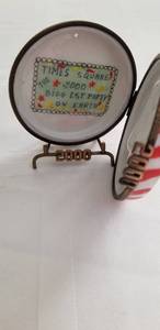 lot 14 image: Porcelain Chanille Limoges Box of Times Square 2000 on Stand
