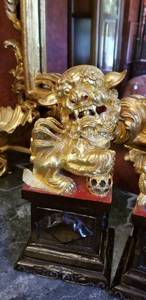 lot 39 image: Carved Gold Lacquer Foo Dog Statues